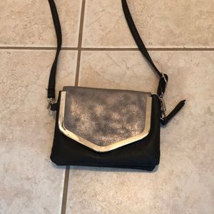 Black and silver fashion clutch purse.